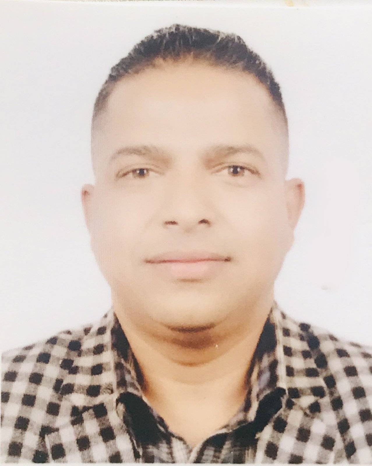 Mr. Bhanubhakta Adhikari